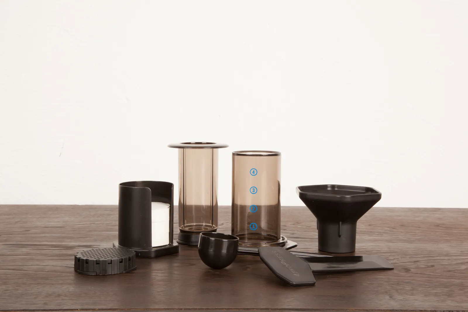 Every component of an AeroPress, laid out